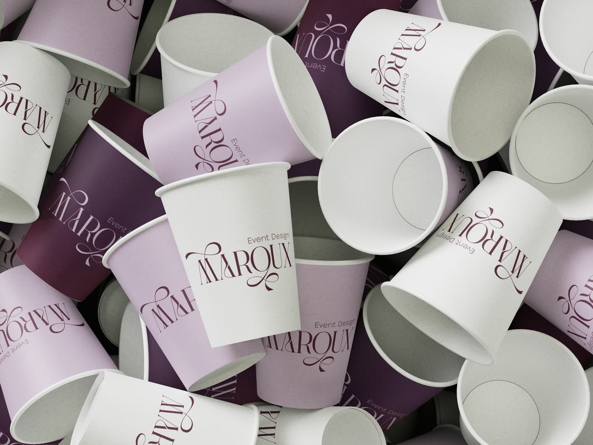 A pile of Maroux paper cups